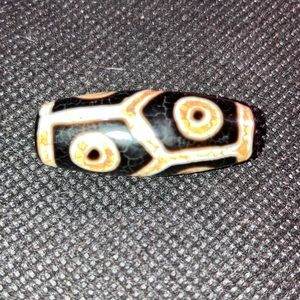 Dzi bead small 6 eyed black and tan bead.